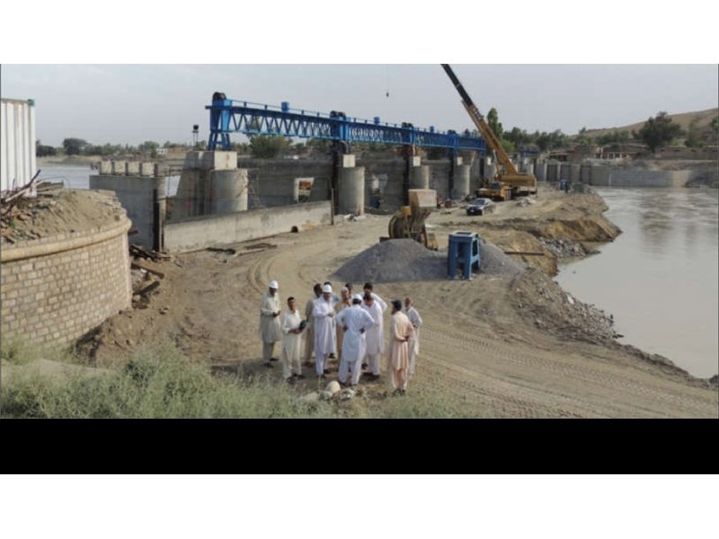 Project photograph from company profile page 135 (REHABILITATION OF MUNDA HEADWORKS BRIDGE & BARRAGE DISTRIC)